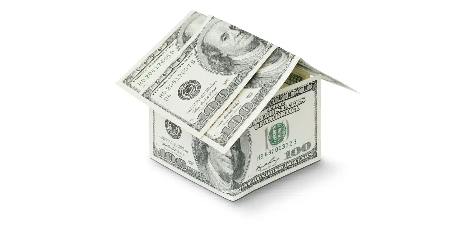 House shape made of US dollar bills representing real estate investment and home financing.